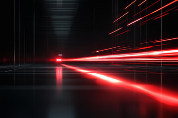 A powerful red laser beam scanning a sleek, glossy black surface. The laser leaves a glowing red trail as it moves horizontally across the surface.  