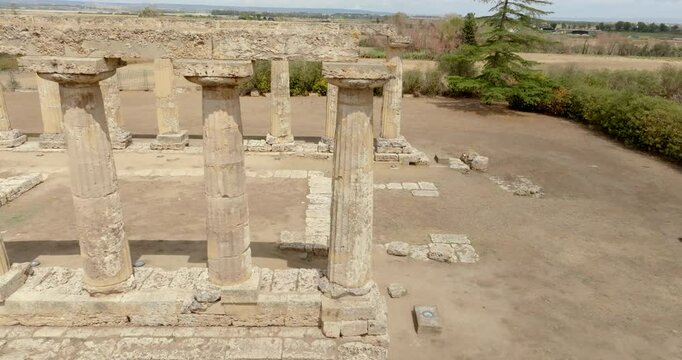 Aerial view of the Tavole Palatine ("Palatine Tables") located in Metaponto, Basilicata, Italy. Closeup of the remains of a hexastyle peripteral Greek temple of Magna Graecia.