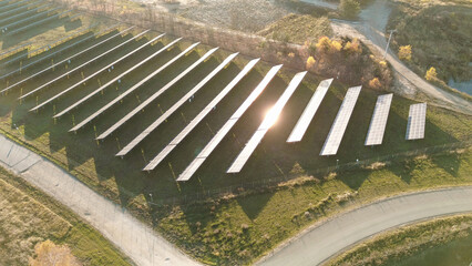Shining sun and solar panel reflections