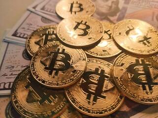 close up bit coins and usd money