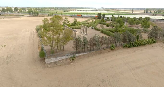 Aerial view of the Tavole Palatine ("Palatine Tables") archaeological park located in Metaponto, Basilicata, Italy. They are the remains of a hexastyle peripteral Greek temple of Magna Graecia.