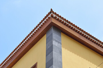 Roman Tile Roof and Stone Corner of Building seen from Below