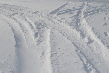 Vehicle Tracks in Freshly Fallen Deep Snow