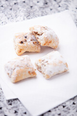 Stollen Bites on bright background. Soft focus. Close up. Copy space.