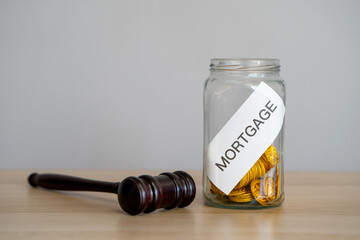 Bank of coins mortgage and judge's hammer. Creation and termination of mortgage agreements. Rights...