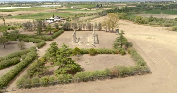 Aerial view of the Tavole Palatine ("Palatine Tables") archaeological park located in Metaponto, Basilicata, Italy. They are the remains of a hexastyle peripteral Greek temple of Magna Graecia.