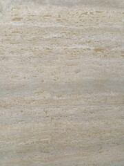 Obraz premium travertine marble texture porous with natural streaks in light brown and gray.