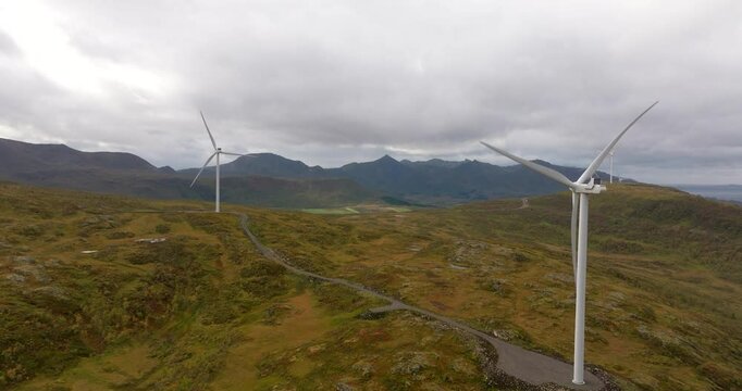 Drone view of wind turbines rotating at wind farm in Sortland municipality, Nordland landscape