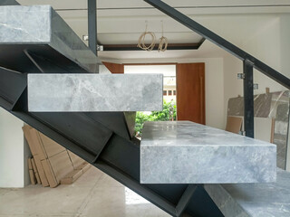Concrete stairs with black iron frame