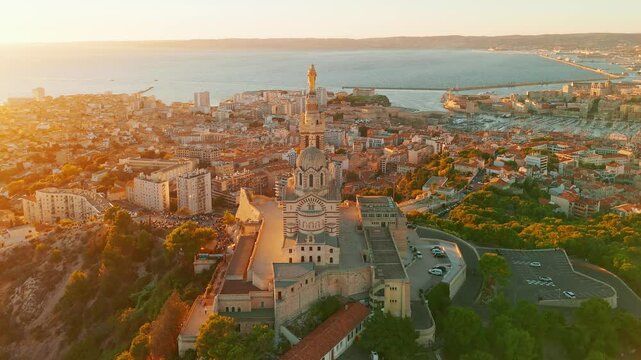 Aerial view of the Notre-Dame de la Garde church at sunset in southern France.