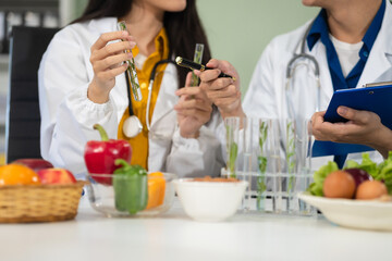 Team Microbiologists Analyzing Molecular Samples in Advanced Food Science Laboratory, Dietitian...