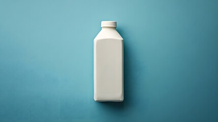 Milk Carton Mockup showcases a clean, minimalist design on a vibrant turquoise backdrop, emphasizing freshness and simplicity suitable for branding projects.