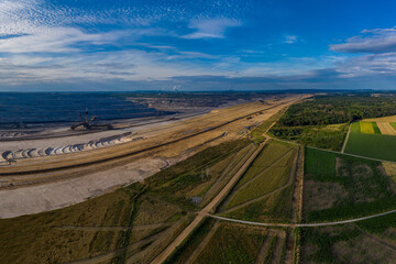 Panoramic view of brown coal mining, drone shot.