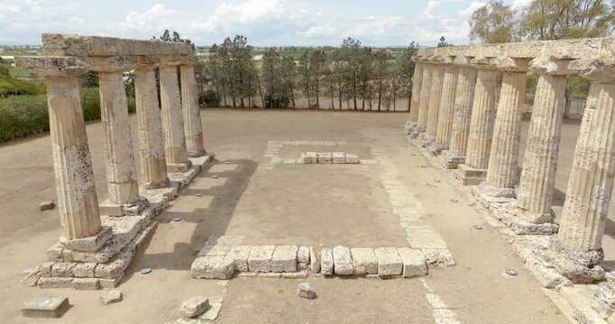 Aerial view of the Tavole Palatine ("Palatine Tables") located in Metaponto, Basilicata, Italy. Closeup of the remains of a hexastyle peripteral Greek temple of Magna Graecia.