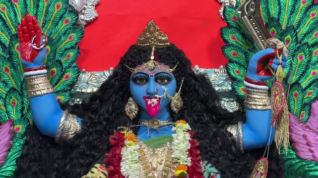 A closeup shot of the visage of goddess Maa Kali.
