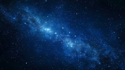 Obraz premium A stunning view of a galaxy in deep space, showcasing vibrant blues and bright stars.