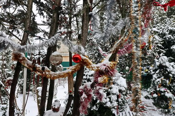 Happy New Year.Christmas tree decorations and toys for fir trees covered with snow and ice. Close-up. Merry Christmas.2024.