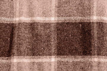 Close-up of plaid fabric in mocha-mousse tones