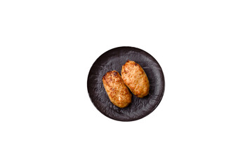 Delicious fresh fried minced fish cutlets with spices and herbs
