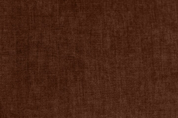 Close-up of brown textured fabric, resembling soft woven material.