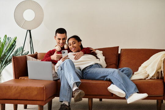 A couple basks in warmth and love while relaxing in their cozy apartment.
