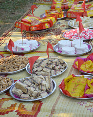 Thai dessert for local wedding ceremony, arranged on patterned mats
