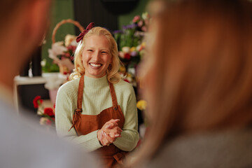 Woman laughing during conversation