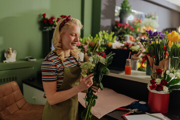 Florist arranging a bouquet of flowers