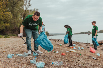 Volunteers cleaning plastic waste from riverbank: protecting the environment