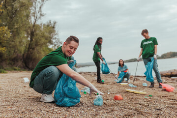 Volunteers cleaning plastic waste on river bank