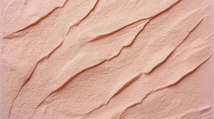 Fototapeta premium Textured Surface with Soft Pink Hues and Gentle Waves