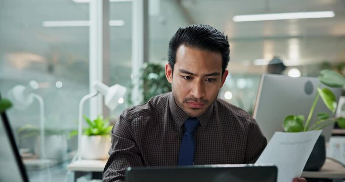 Document, accountant and business man on laptop with sales revenue, reading report and savings. Computer, paperwork and auditor check information, profit comparison or financial bookkeeping in office
