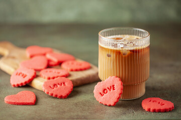 Red Heart Form. Homemade Shortbread Cookies for Valentine's day. Ice coffee with cream