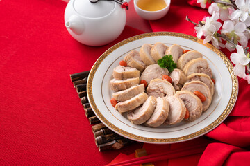 Delicious sliced chicken roll soaked in Chinese wine for lunar new year's dishes.