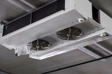 Industrial air cooler and ceiling-mounted refrigeration unit for temperature control in large...
