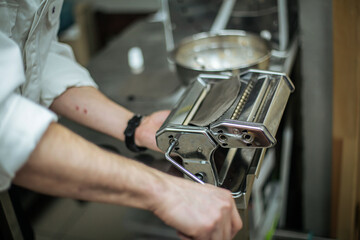 Cooking black khinkali in the restaurant kitchen