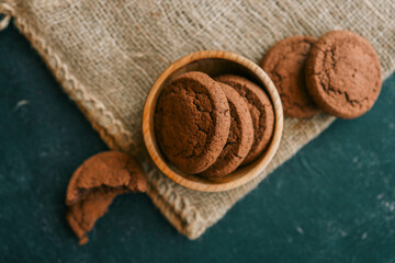 Chocolate brownie cookies in a wooden plate, sweets