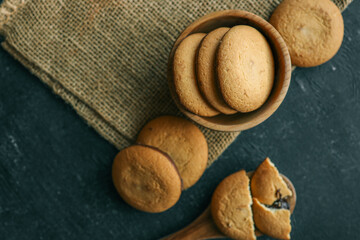 Chocolate brownie cookies in a wooden plate, sweets