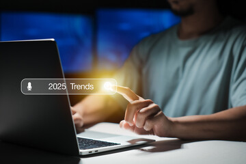 Search engine bar with 2025 trends wording for marketing monitor and business planing in new year concept. Finding information and new ideas for doing business in 2025.