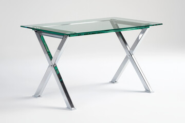Stylish glass table with metallic frame, perfect for modern office or home decor.