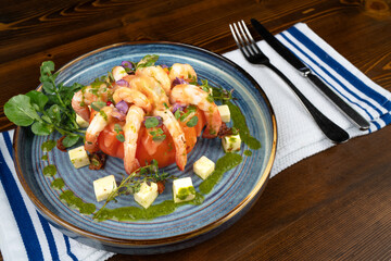 Seafood Shrimp and tomato. Elegantly presented shrimp with tomato sauce.
