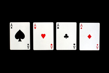 Four types of cards from the deck lie on a black background.