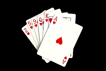 Cards of the same suit lie on a black background.