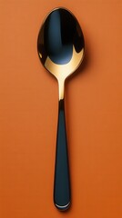 A Luxurious Gold-Black Spoon, Perfect for Fine Dining