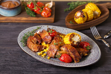 Barbecue grilled pork spare ribs with vegetables on a plate
