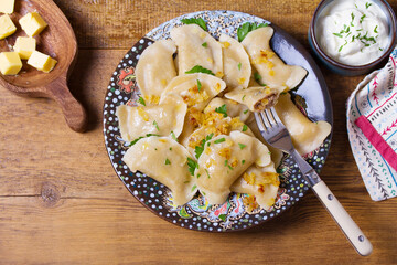 Dumplings with minced meat filling. Varenyky, vareniki, pierogi, pyrohy - dumplings with filling. High angle view
