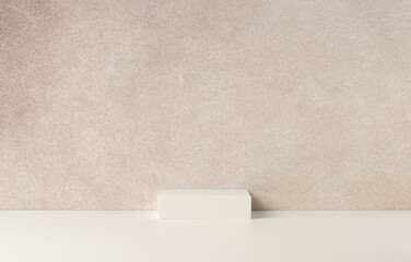 Minimalistic Stage for Product Presentation made with White Square Podium on the Wall Background. Studio Photography.
