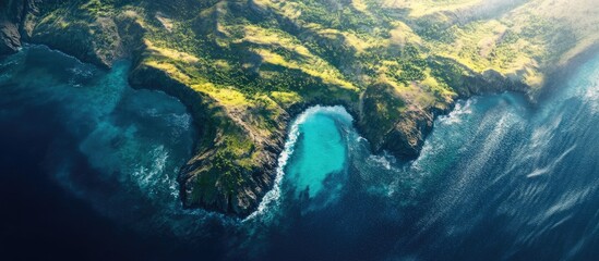 Aerial view of a lush island landscape showcasing vibrant greenery and stunning coastal waters under bright sunlight.