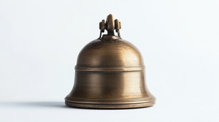 Small antique brass bell on its side isolated against a clean white background showcasing its vintage patina and craftsmanship.