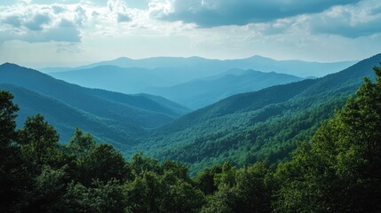 Naklejka premium Serene mountain landscape with lush green valleys under a cloudy sky showcasing natural beauty and tranquility in nature.